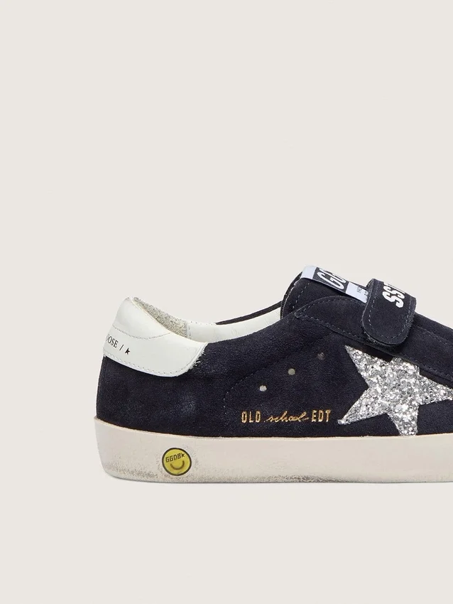 Junior Old School in blue suede with silver glitter star and white leather heel tab