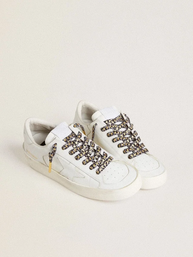 Laces with gray and black animal print with contrasting gold stars