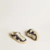 May Junior in white and blue leather with leather star and heel tab