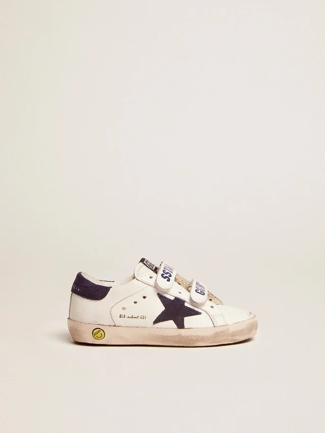 Old School Junior in white leather with blue suede star and heel tab