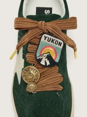 Skins burgundy and peach embroidered laces with patch and two charms