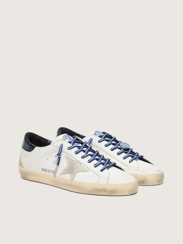 Women’s Super-Star LTD in white leather with suede star and blue leather heel tab