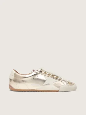 Women’s True-Star in metallic platinum leather with light gray suede star